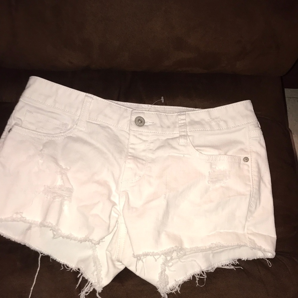White cutoff shorts
